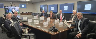 In a meeting with USPS Postmaster General David Steiner (right) and Margaret Pepe, executive director product solutions (on screen), the NNA Postal Team discussed newspaper delivery problems. Left to right: Interlink CEO Brad Hill, Lindsey Taylor, USPS director of industry outreach and engagement; Rafe Morrissey, Morrissey Strategic Partners; Steve Monteith, USPS chief customer & marketing officer and executive vice president, NNA Director of Public Policy Lisa McGraw, NNA Treasurer Jeremy Gulban, CEO, CherryRoad Technologies; and NNA Postal Chair Matt Paxton, publisher, The News-Gazette, Lexington, Virginia.