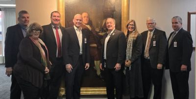 The NNA Postal Team met with USPS Postmaster General David Steiner (center, right) at USPS headquarters in Washington, D.C., on Dec. 8. Left to right: Steve Monteith, USPS chief customer & marketing officer and executive vice president; NNA Director of Public Policy Lisa McGraw, NNA Treasurer Jeremy Gulban, CEO, CherryRoad Technologies; Interlink CEO Brad Hill, Steiner, NNA Executive Director Lynne Lance, NNA Postal Chair Matt Paxton, publisher, The News-Gazette, Lexington, Virginia; and NNA consultant Rafe Morrissey, Morrissey Strategic Partners.