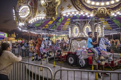 Families enjoy a midway ride on Wednesday, October 25, the opening day of the Williamson County Fair and Rodeo, held at the Williamson County Expo Center through October 28. (Date of publication: Oct. 29, 2023) (Andy Sharp, Williamson County Sun, Sunday Sun, Georgetown, Texas)