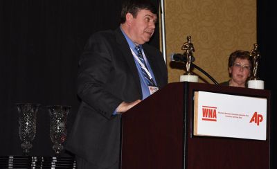 Brian Thomsen, publisher of The Valders Journal, makes his first appearance as Wisconsin Newspaper Association president on Feb. 26, 2016, during the Better Newspaper Contest Awards banquet in Middleton.  (Photo by Mary Callen)