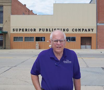Bill Blauvelt tells the story of his newspaper building front. Back in 1975, the town wanted to create more modern curb appeal and encouraged local businesses in Superior to install tin panels. Today, the town wants to remove the tin and restore the buildings to their original fronts.