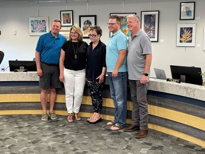 Sue Orsen (center) takes a picture with four of the five Victoria City Council members after Mayor Deb McMillan read a proclamation recognizing her and the Victoria Gazette. (Sue Orsen)